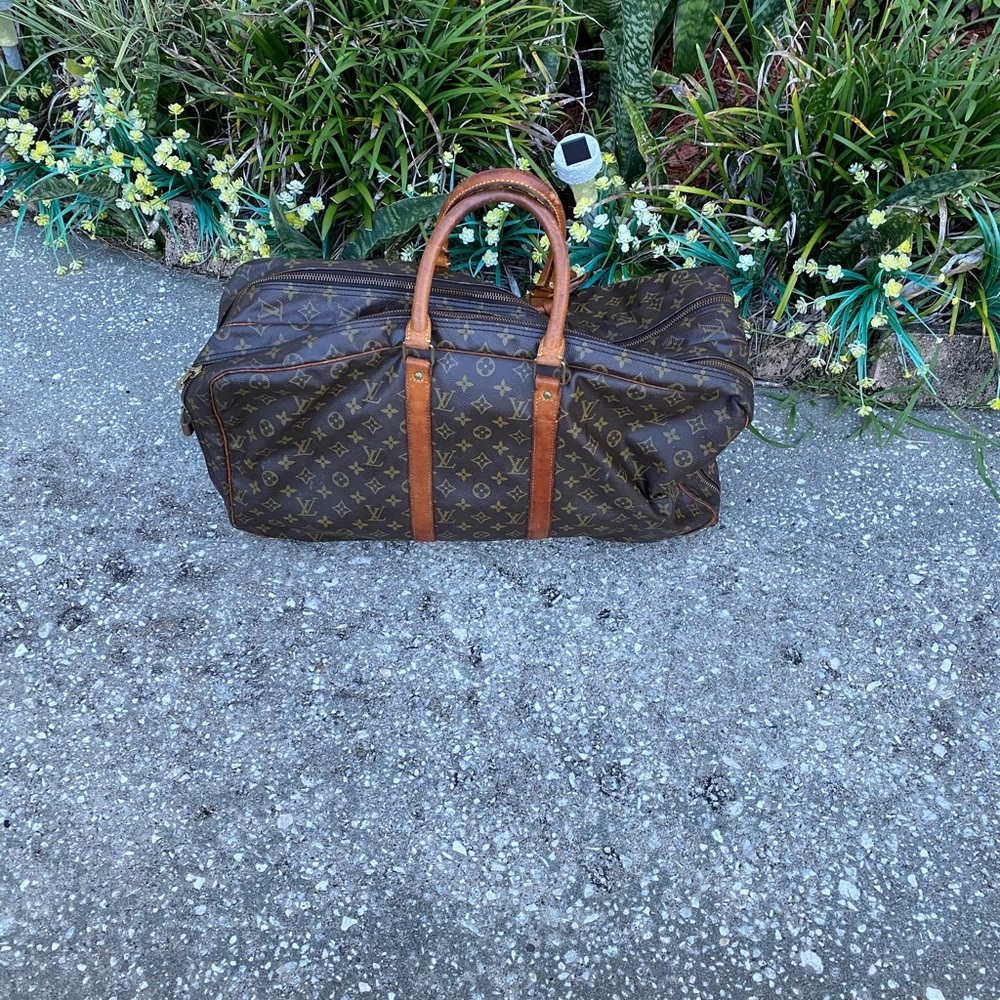 LV leather, monogrammed, large carry on